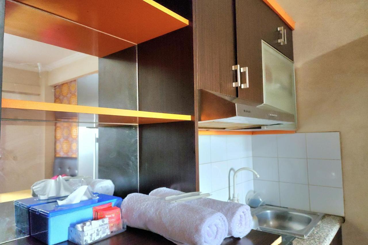 Queen 2 @ Grand Center Point Apartemen *