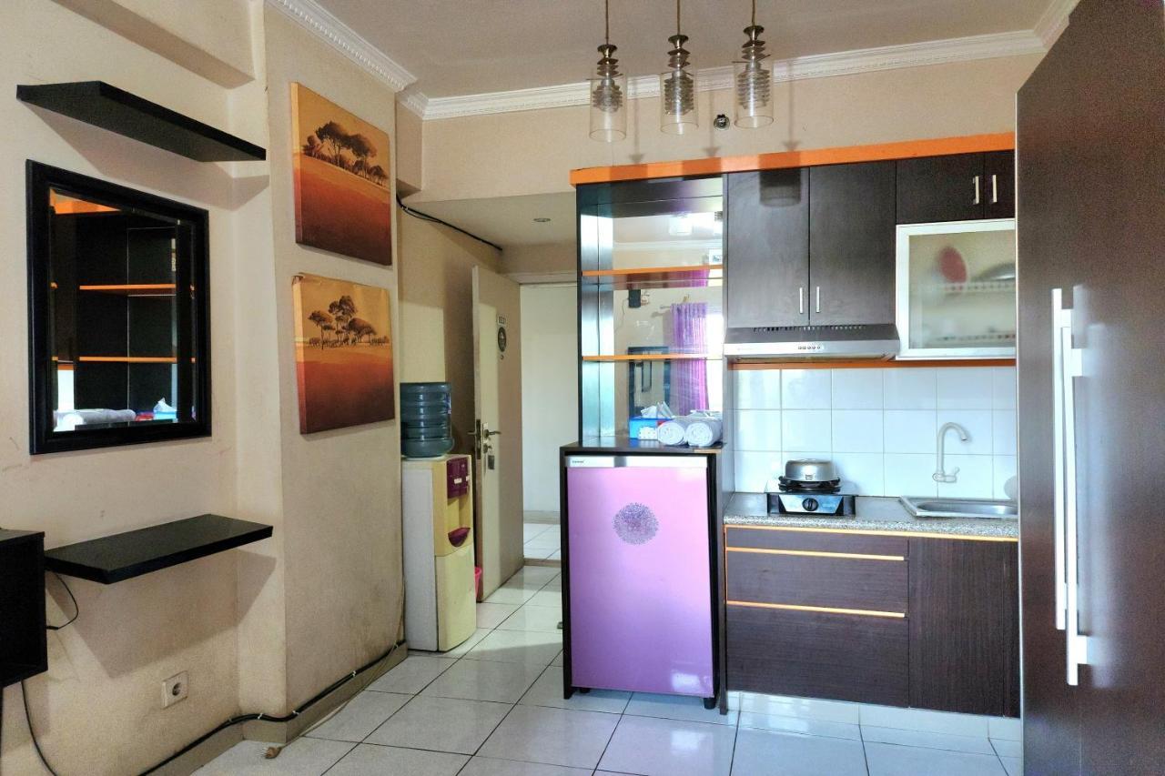 Queen 2 @ Grand Center Point Apartemen