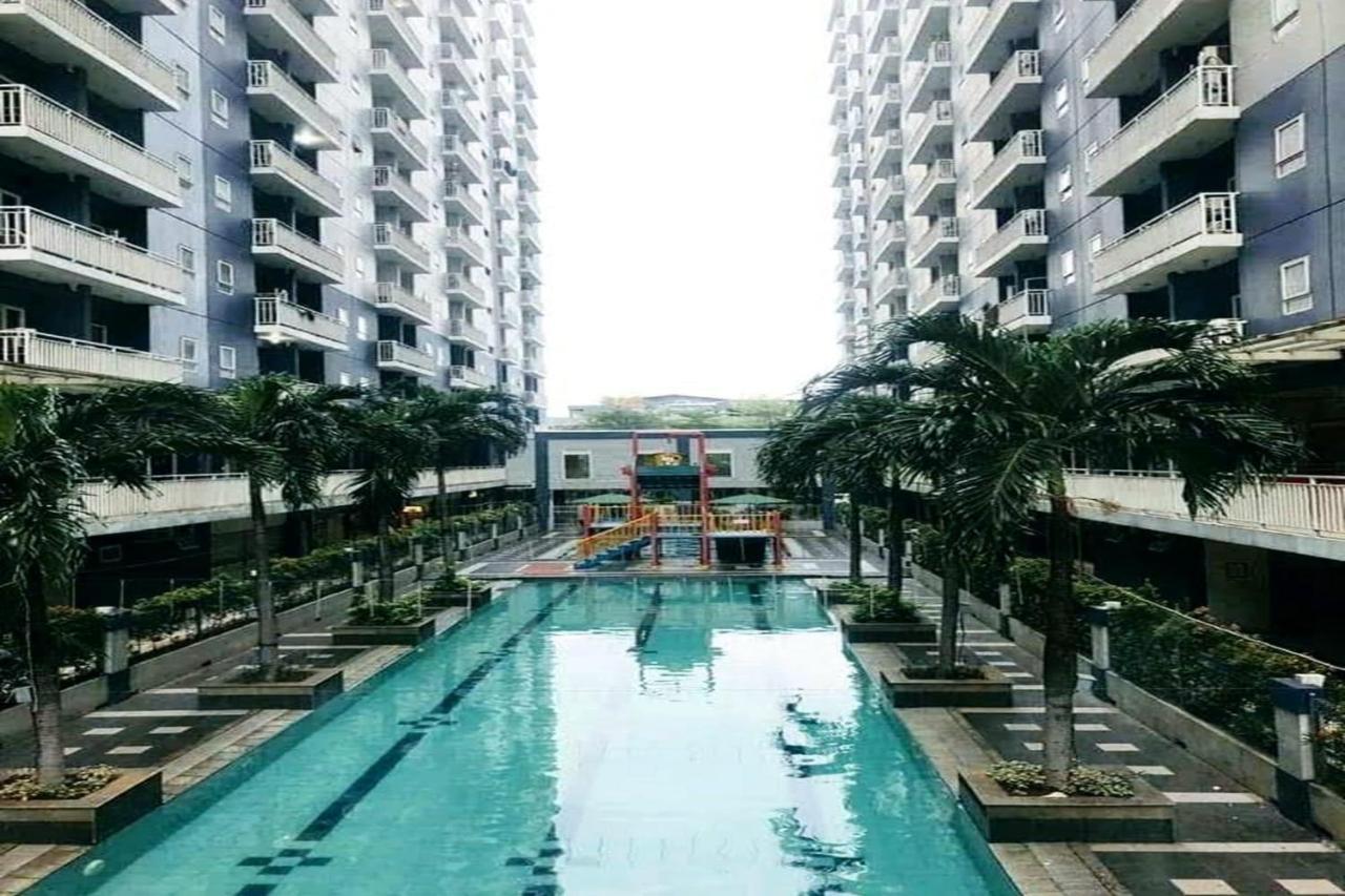 Queen 2 @ Grand Center Point Apartemen