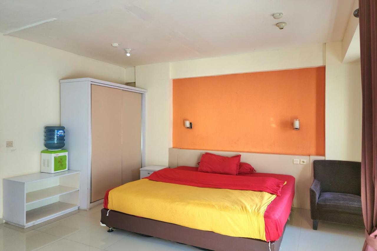 Queen 2 @ Grand Center Point Apartemen *