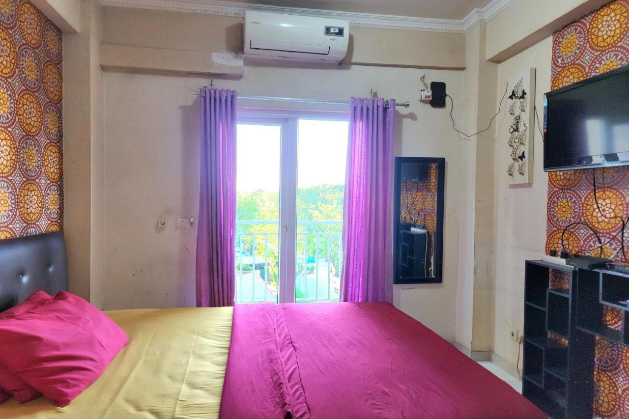 Queen 2 @ Grand Center Point Apartemen *