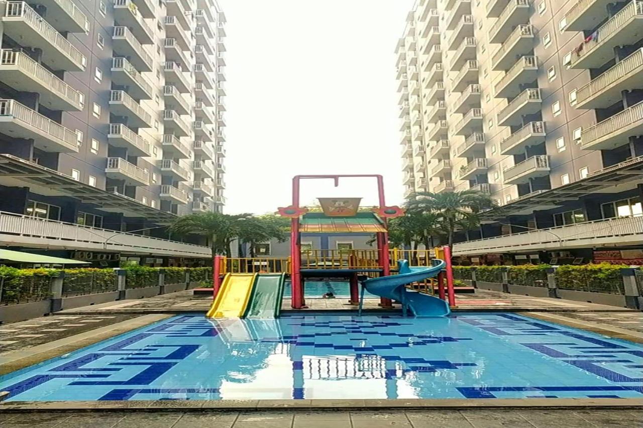 Queen 2 @ Grand Center Point Apartemen