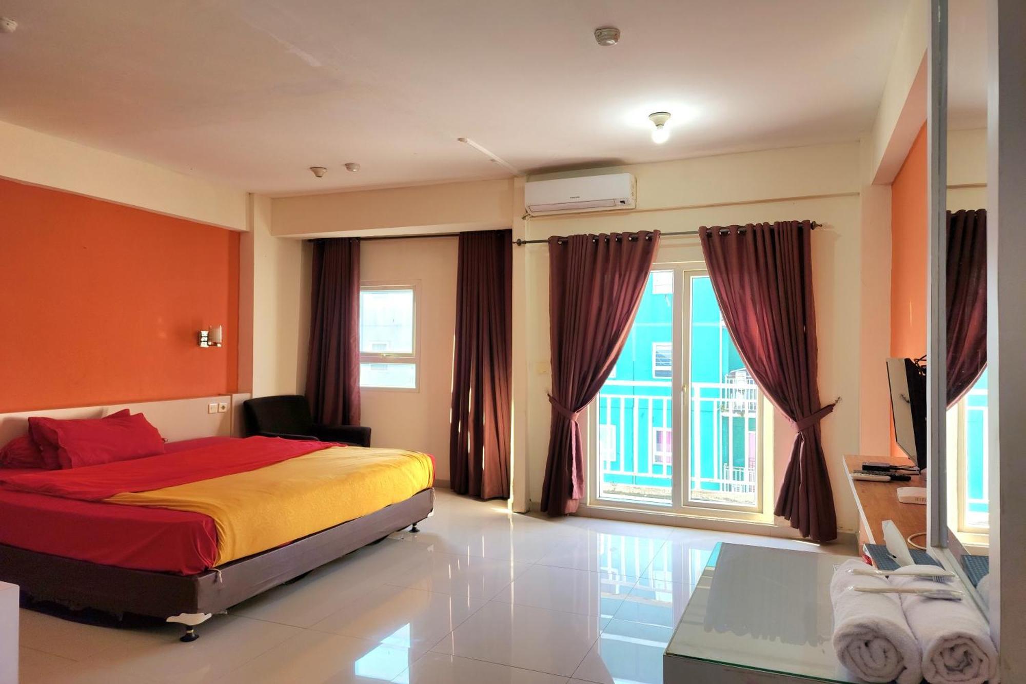 Queen 2 @ Grand Center Point Apartemen